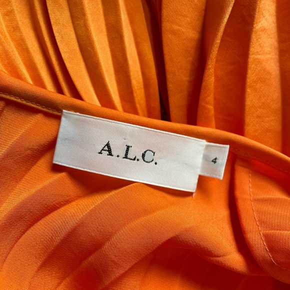 Snazzy Pleated Orange Asymmetrical A.L.C dress. - Picture 9 of 13